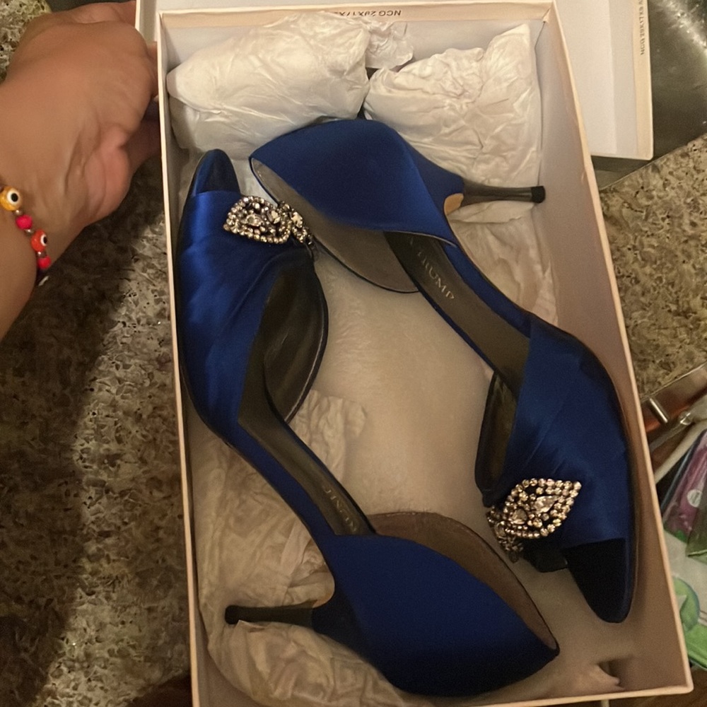 Ivanka Trump . Blue satin heels. Size 8w. Great condition.